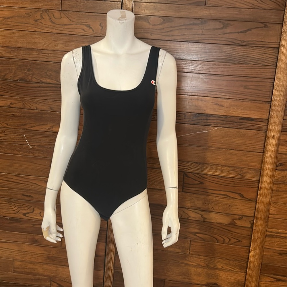 Champion size small women’s body suit fasten at undercarriage black